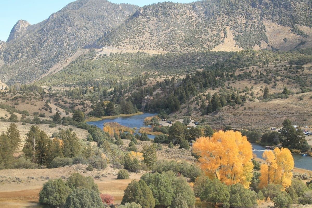 Dramatic mountain valley with river winding through Colorado Rocky Mountains