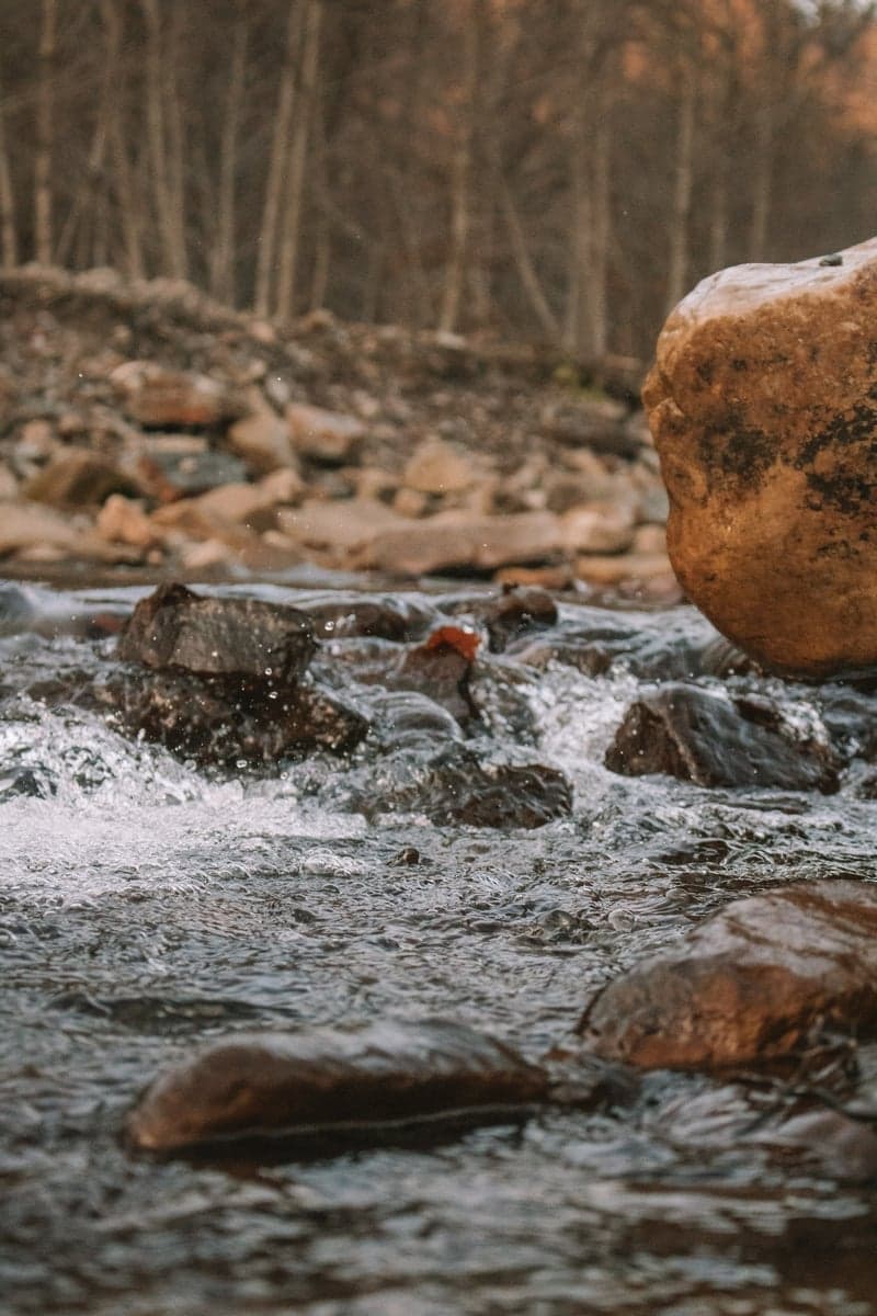 Shin-deep riffle at a slow walking pace: a depth-velocity product around 2, and about as safe as moving water gets.