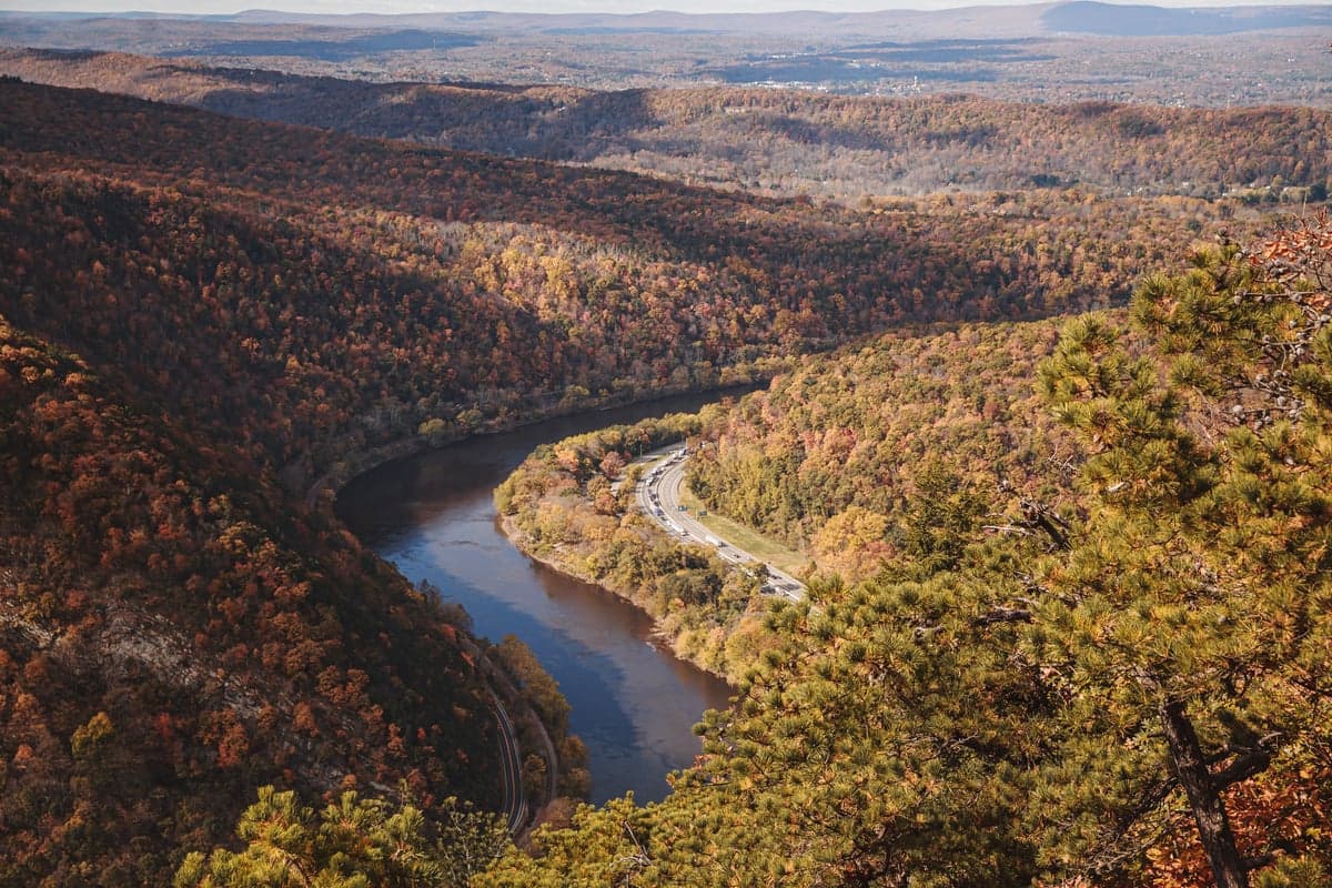 Autumn view over the upper Delaware valley with fall foliage and the river winding below