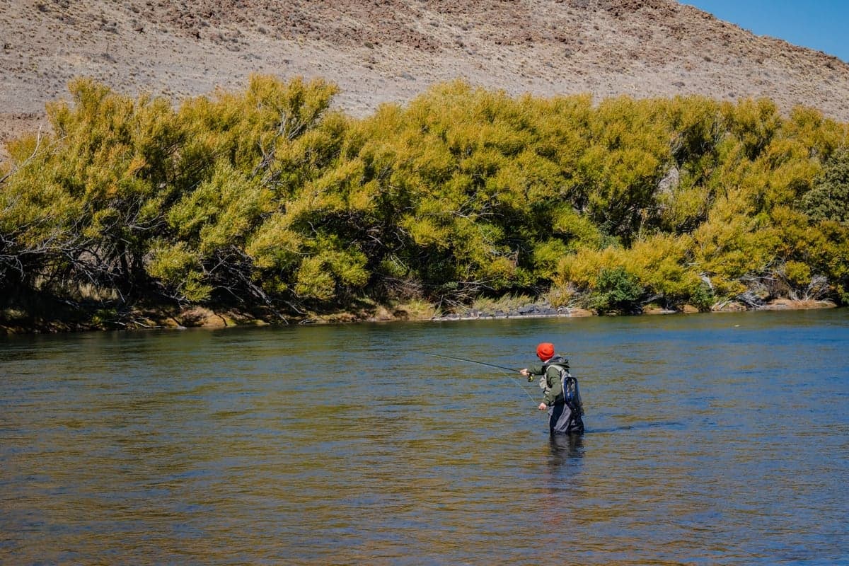 Work the deep water and stay off the shallow gravel. It's not much of a sacrifice, and the fish in the runs are eating better anyway.