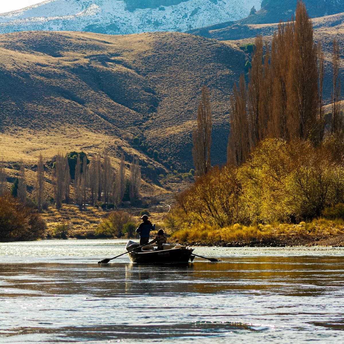 Float fishing the Snake - drift boats navigate braided channels while anglers work the banks
